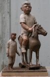 Boy with Toys by James Stewart, Painted Terracotta 20 x 12 x 8